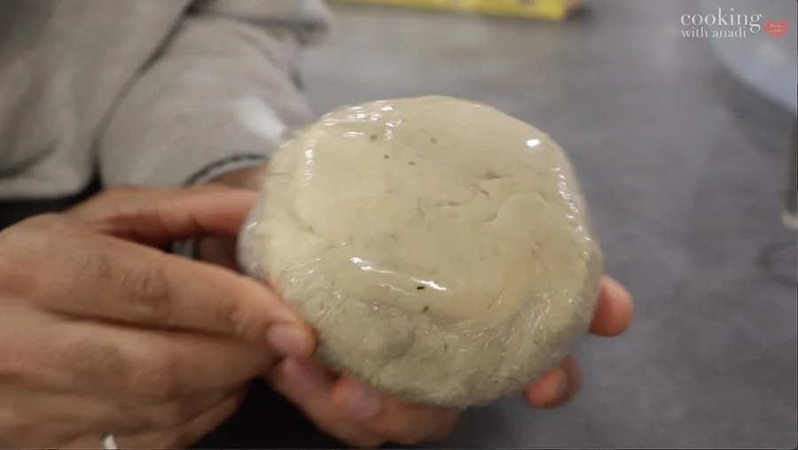 strukli dough rolled in plastic