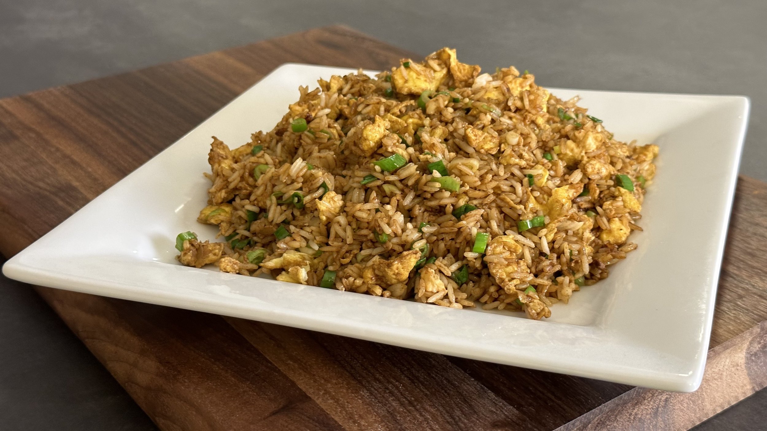 Premium Photo  Fried rice with pork and fried egg in japanese