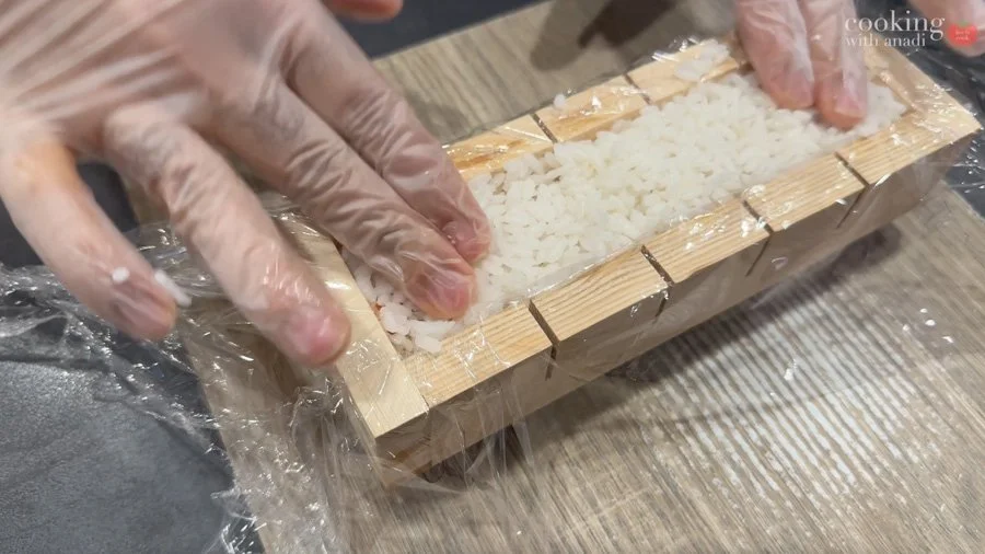 topping with remaining rice