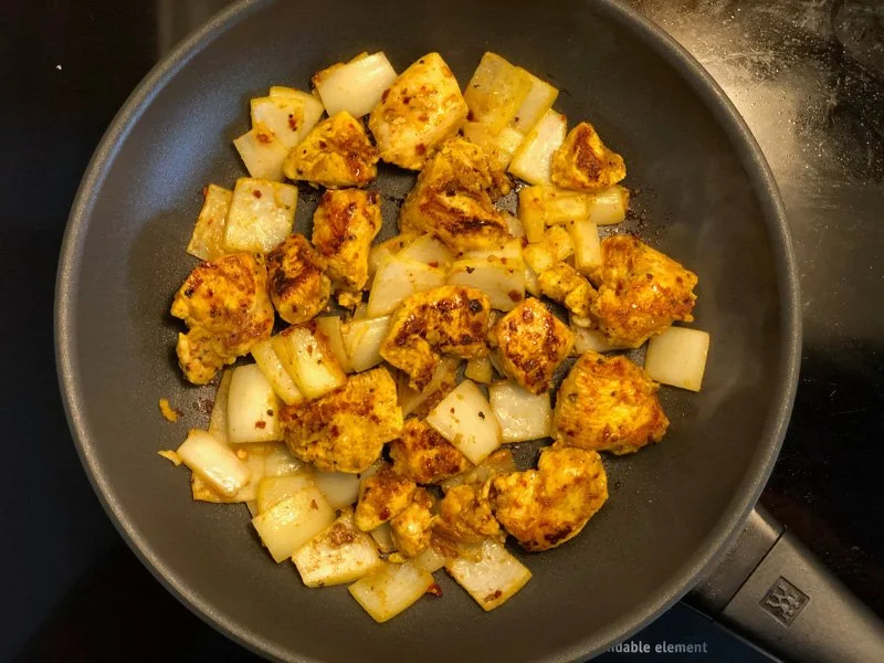 cooking chicken and onions