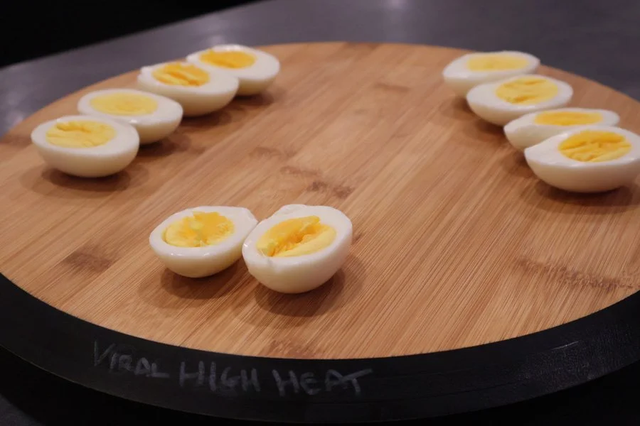 various boiled eggs on a board