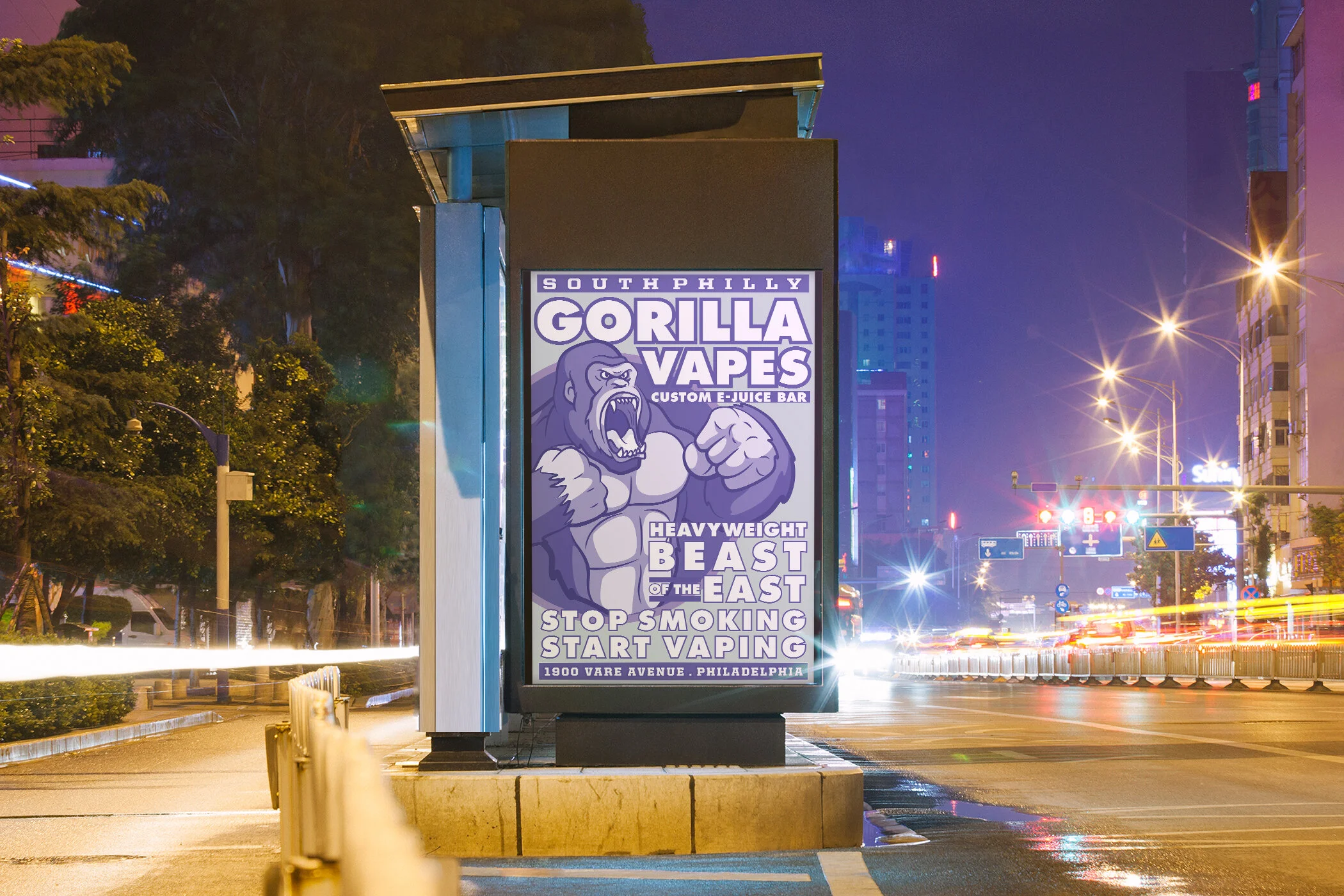 Nighttime photograph of a Gorilla Vapes graphic advertisement installed in a South Philadelphia bus-stop display