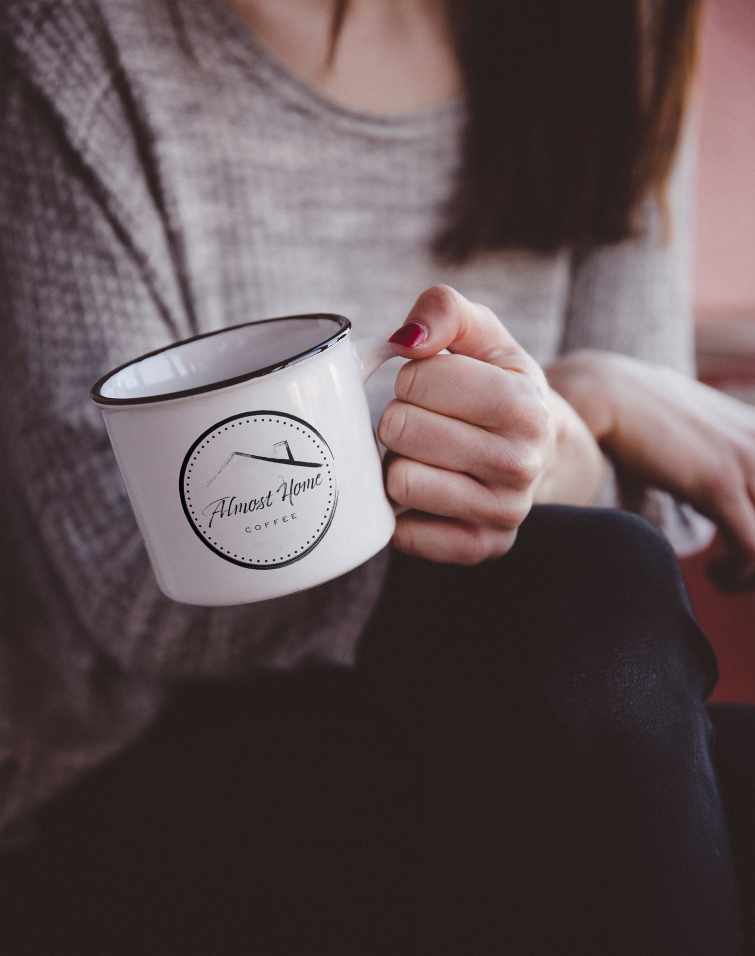Almost Home Coffee logo on white enamel mug