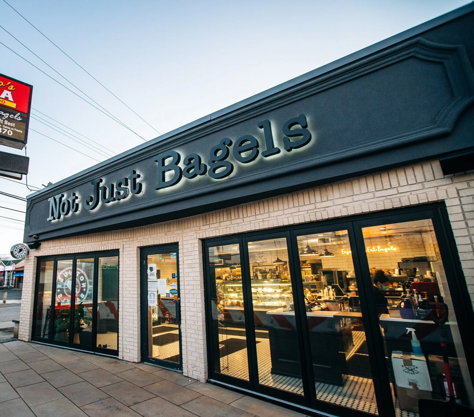 Not Just Bagels Staten Island storefront and dark exterior signage