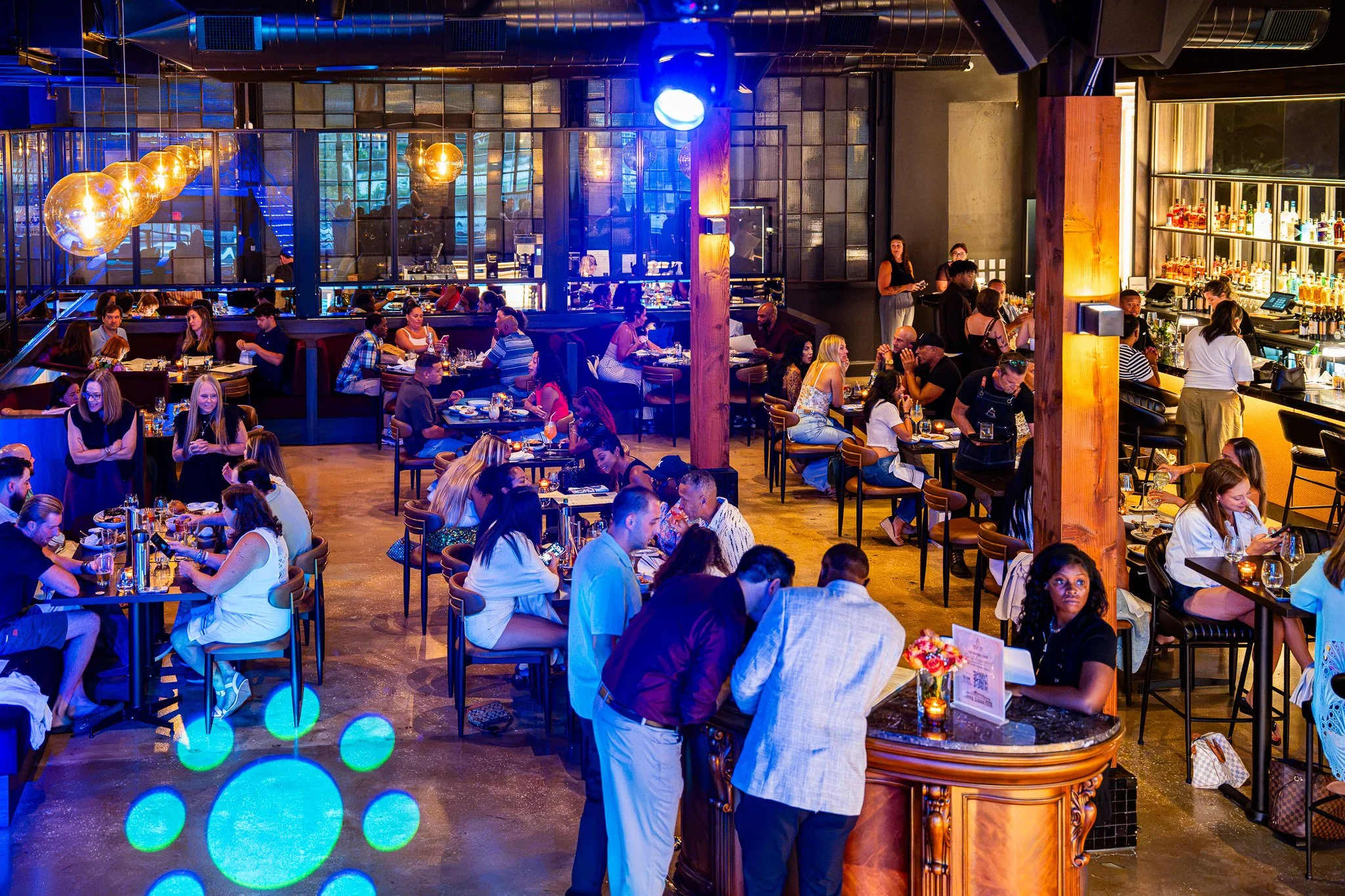 Asbury Social guests and dining space photographed by Start Monday