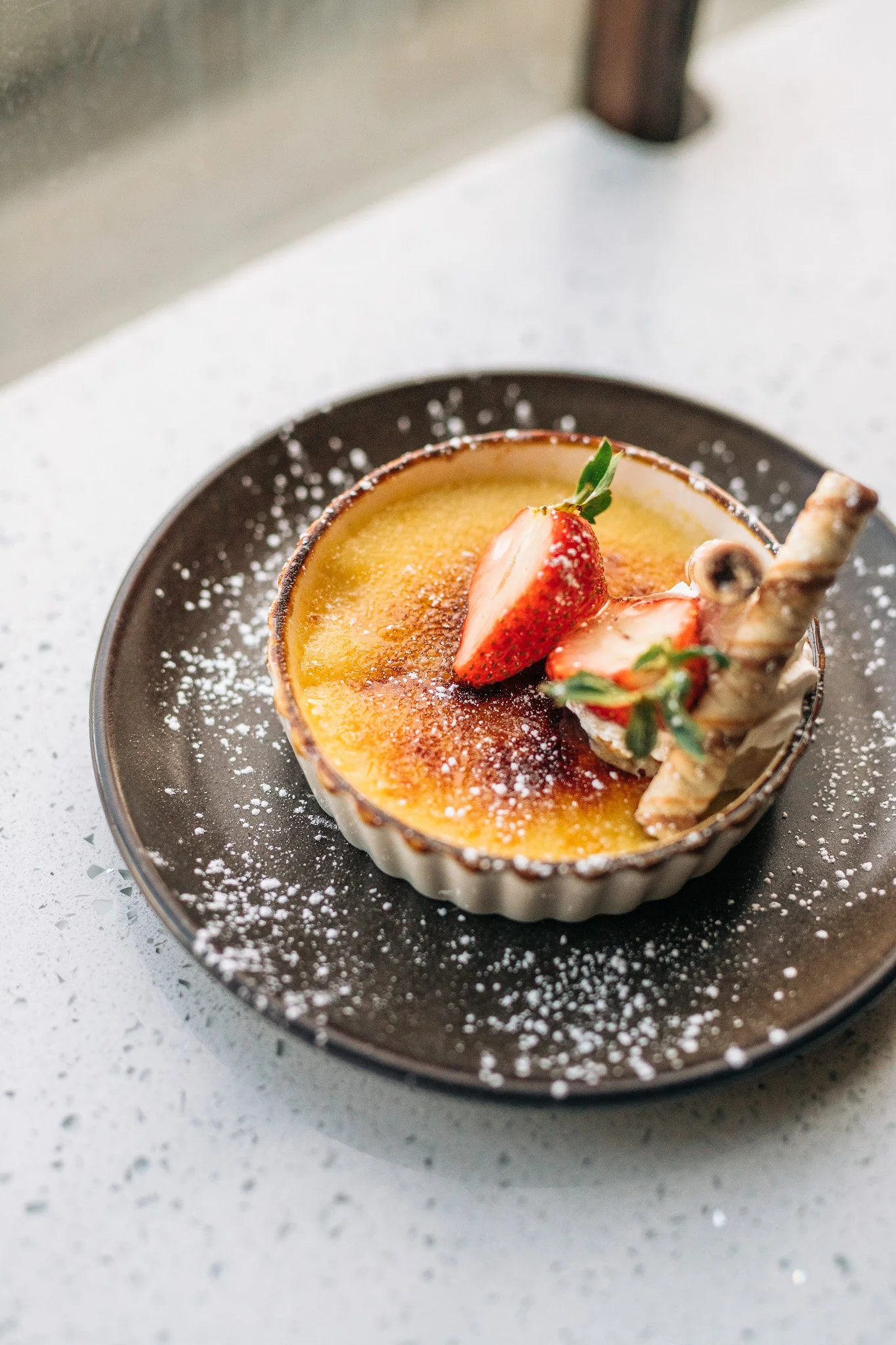 Dessert tart with caramelized surface and strawberry