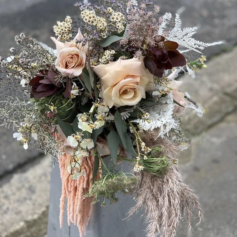 Wild textural Luna Moss bouquet with pampas grass, orchids and trailing amaranthus