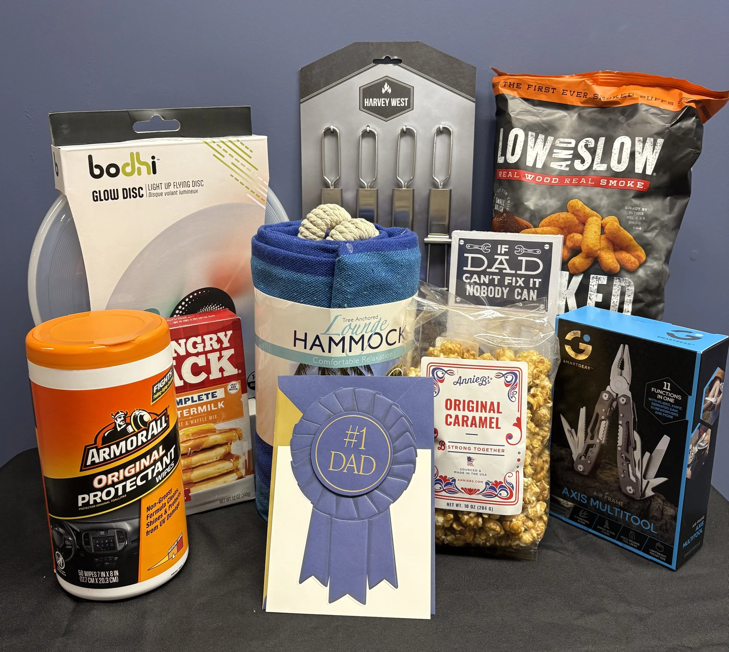 Glow disc, ArmorAll, Caramel corn, Axis multitool, Lounge hammock, "dad" notepad, pancake mix, Grilling skewers, BBQ puffs, and a Father's Day card!!!