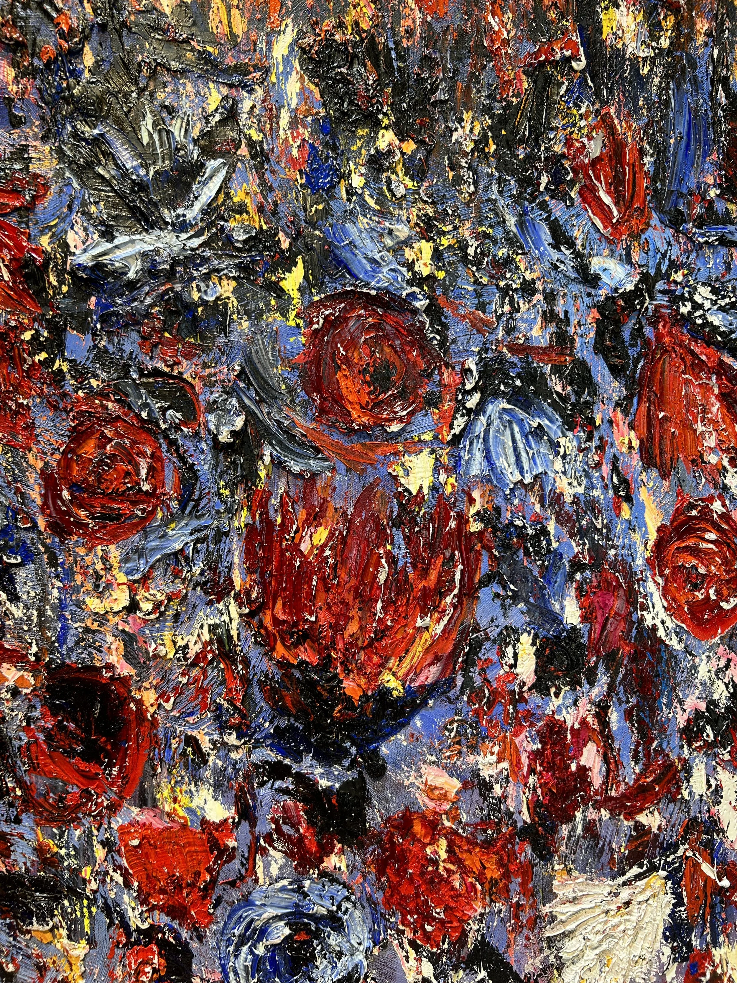 Close-up of an abstract oil painting featuring red roses and multicolored brushstrokes with prominent textures.