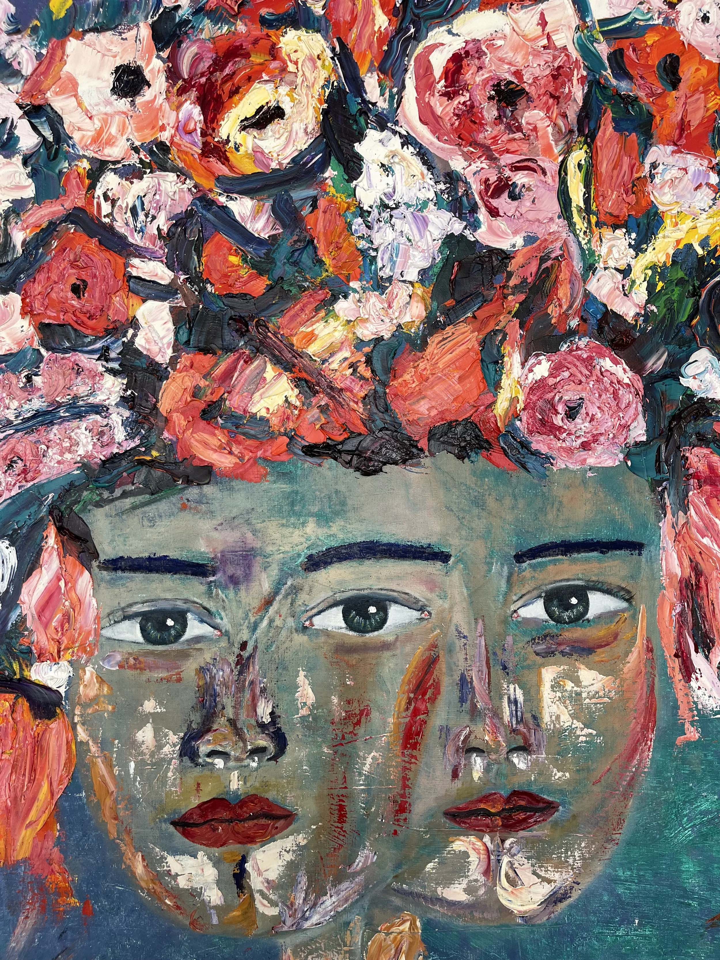 An abstract portrait of a woman with two faces, surrounded by pink and red flowers, painted with thick, expressive brushstrokes.