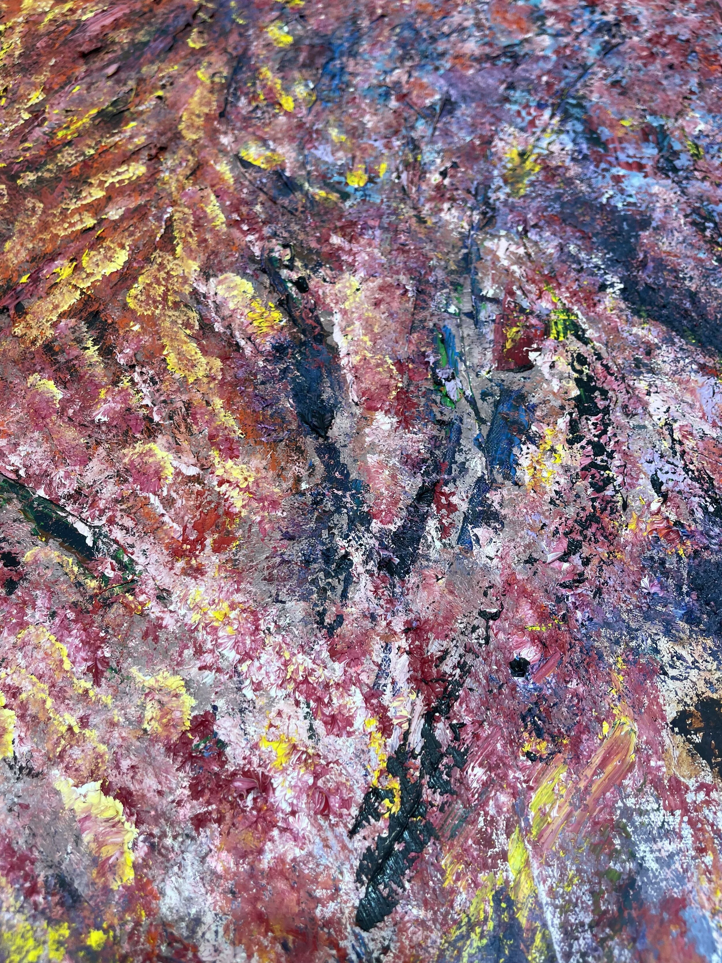 Close-up of an abstract painting with pink, yellow, black, white, and blue colors, featuring textured brushstrokes and layered paint.