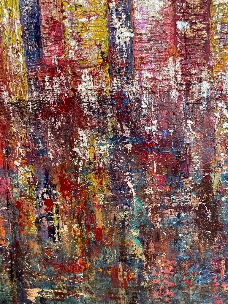 Abstract impressionist painting with vibrant splashes of red, yellow, blue, purple, and white, creating a textured, colorful composition.