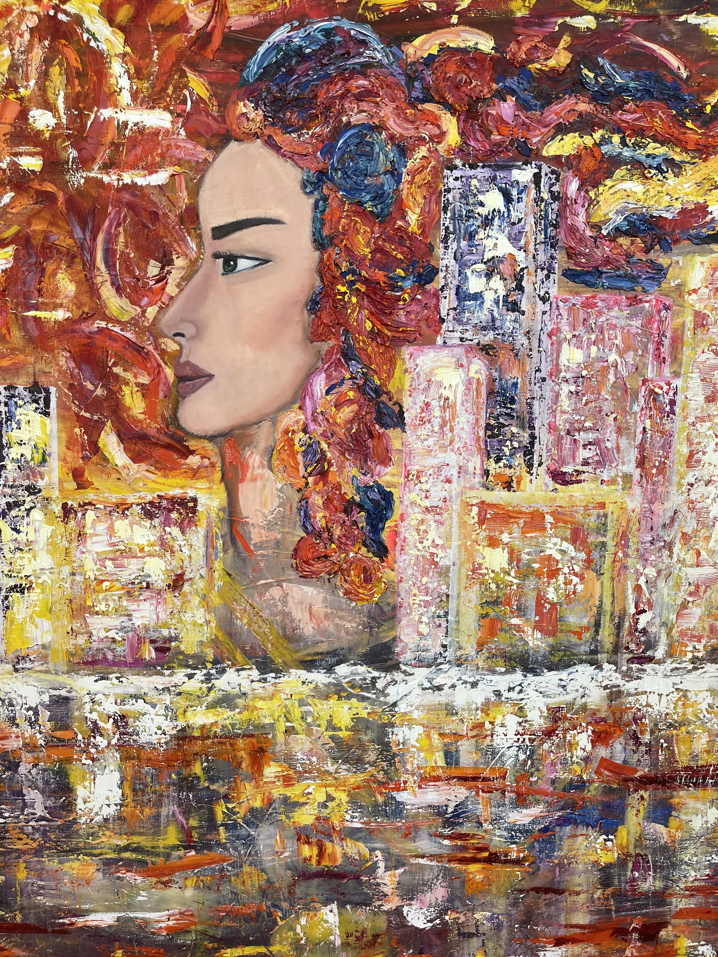 A colorful abstract painting depicting a woman's face in profile with blue, red, pink, and orange hair, set against a vibrant, textured background of city skyscrapers and reflections in water.