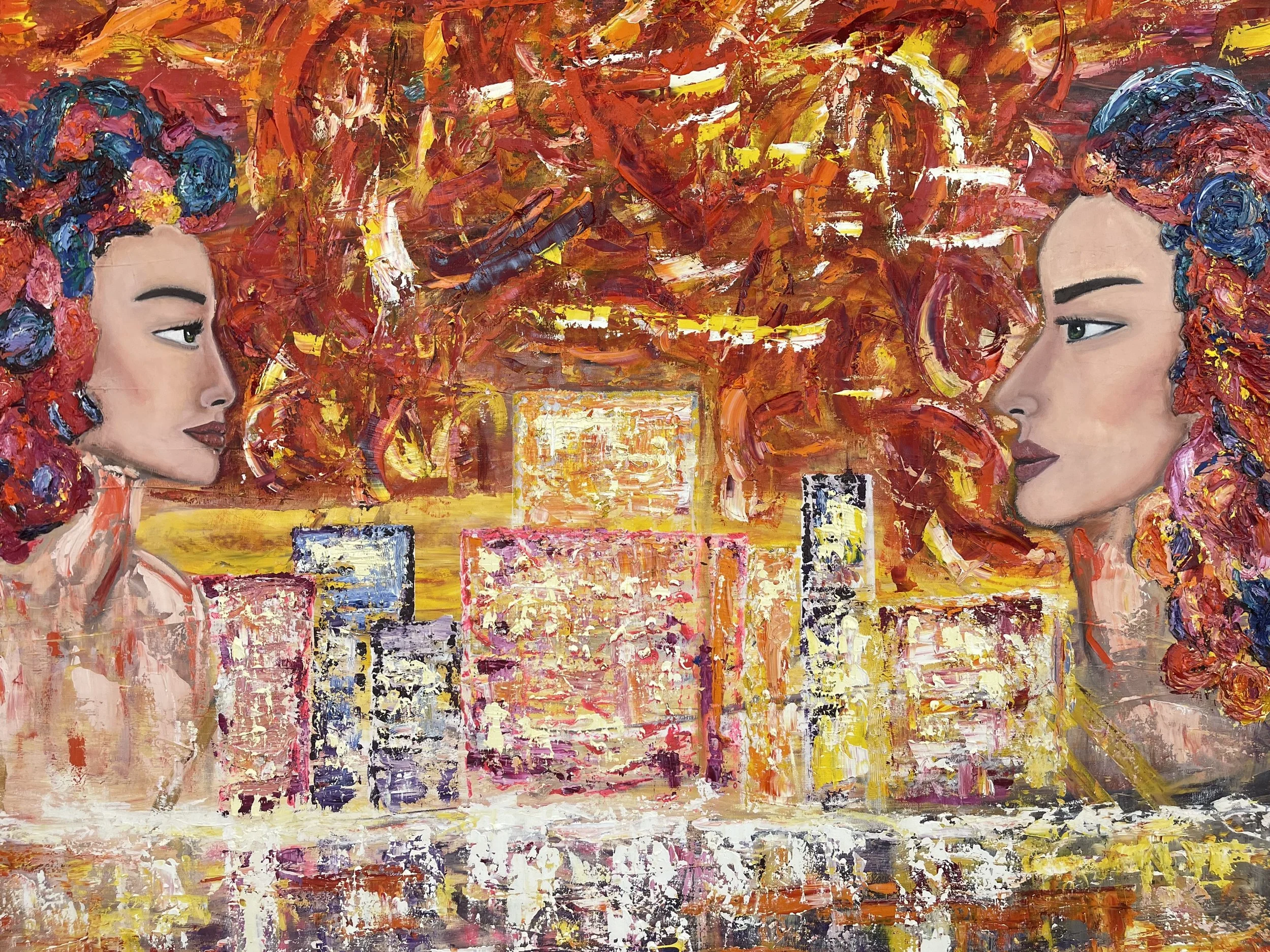 An abstract painting featuring two women with vibrant, colorful curly hair facing each other against a cityscape background with tall buildings, using bold brushstrokes and warm colors like red, orange, and yellow.