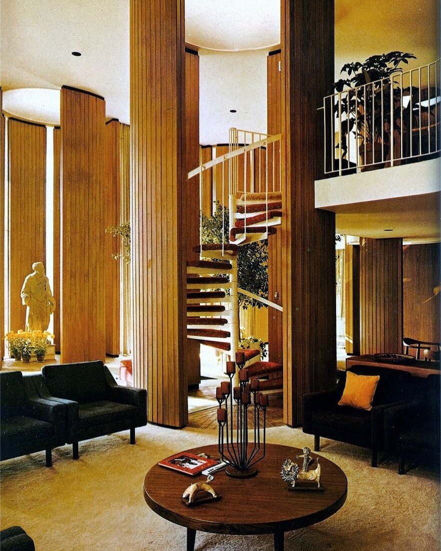 that spiral staircase is literally the centre of attention.