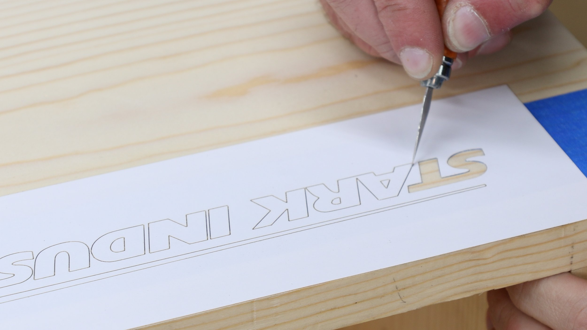 Stark Industries logo on a wood crate