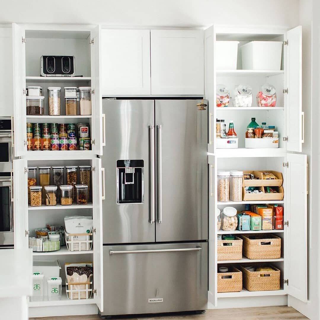 FEATURE POST - @simplyorganizedco shows us how to maximize every inch of deep pantry shelving.

Bins and risers help utilize the space without allowing items to get squished and lost towards the back of a cabinet. Function and form are absolutely on 