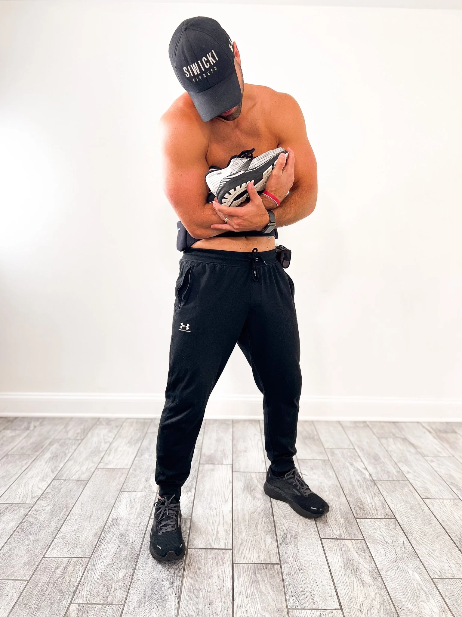 Jacob Siwicki holding shoe