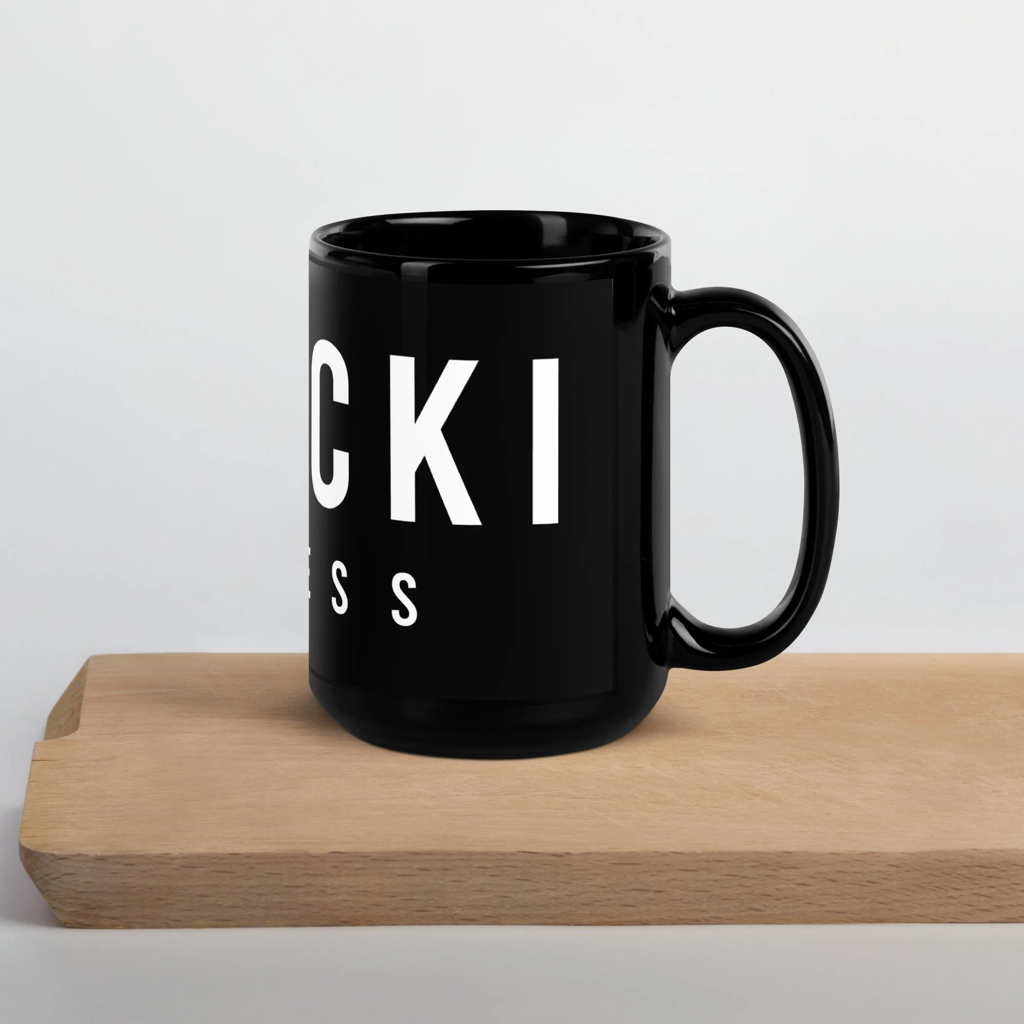 black-glossy-mug-black-15oz-handle-on-right-634d9c6c5403e.jpg