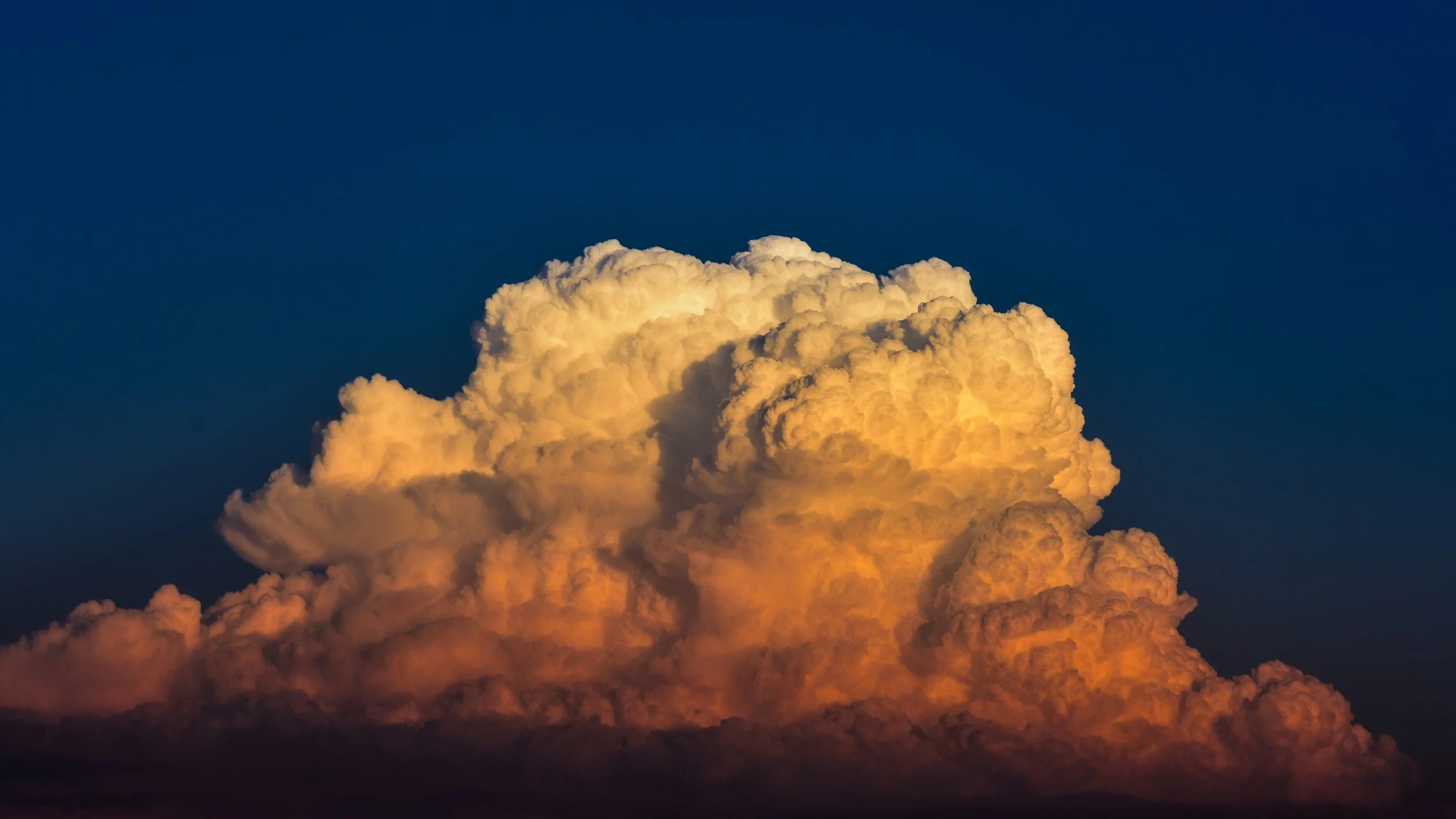 Terrain Wakes Trigger Pyrovortices and Pyrocumulonimbus