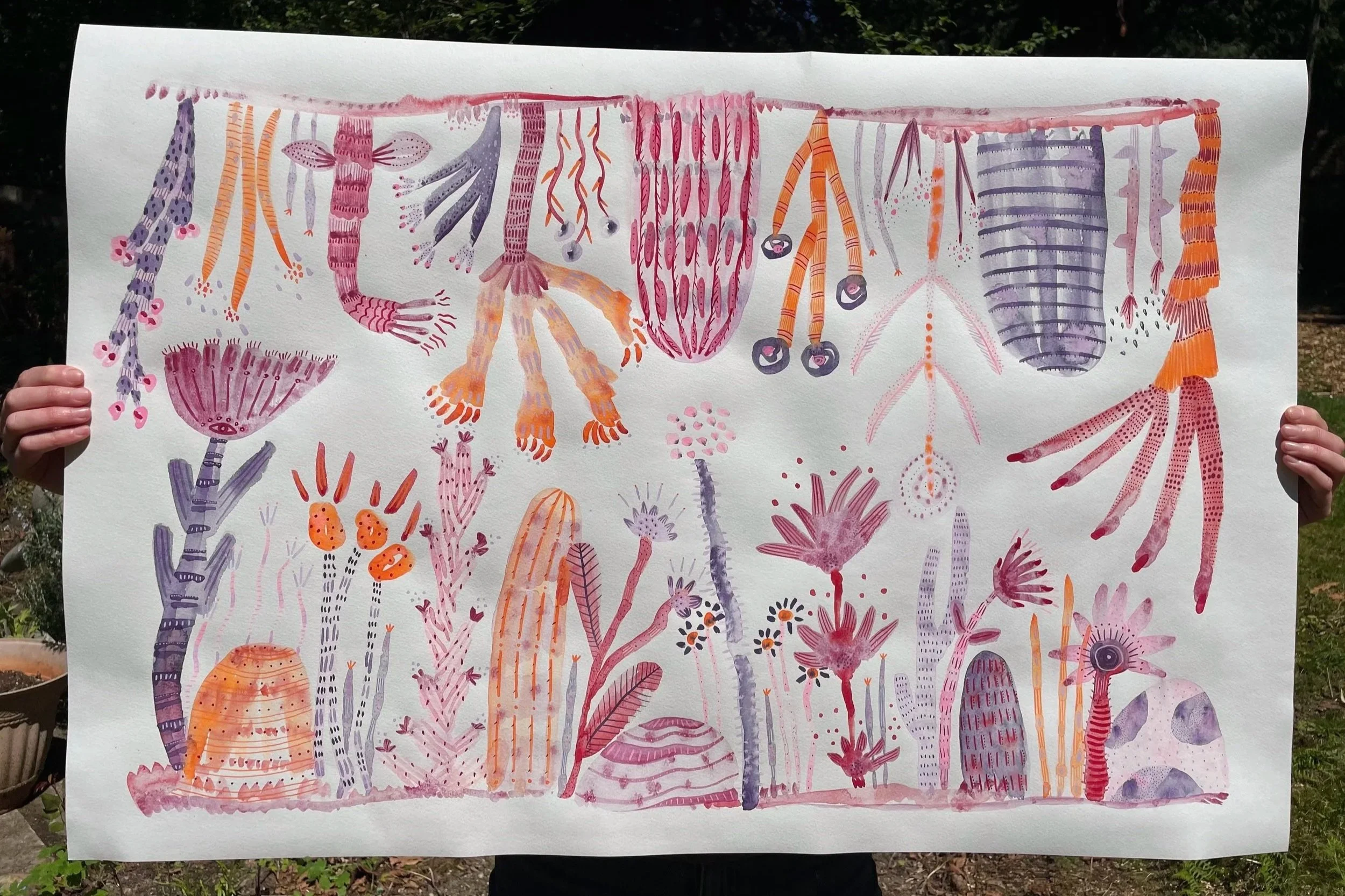 Image of a painted canvas with abstract watercolors in reflecting pattern.