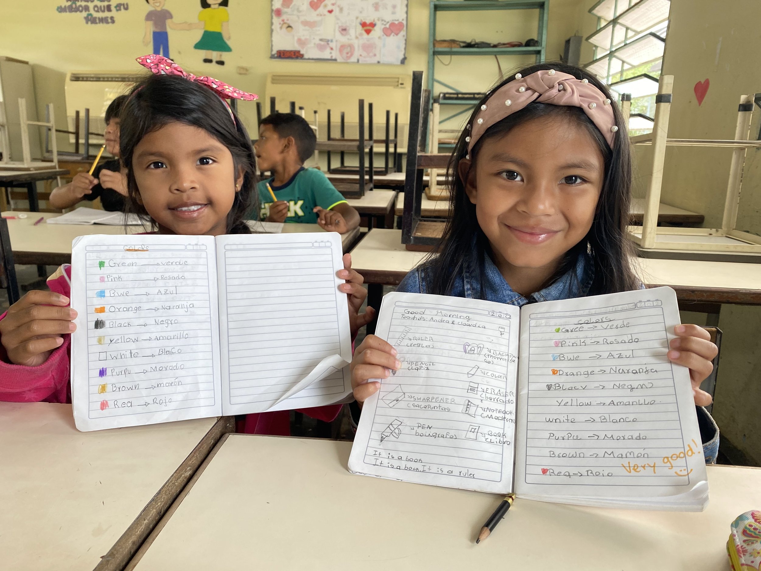 Canaima students showing us their homework.