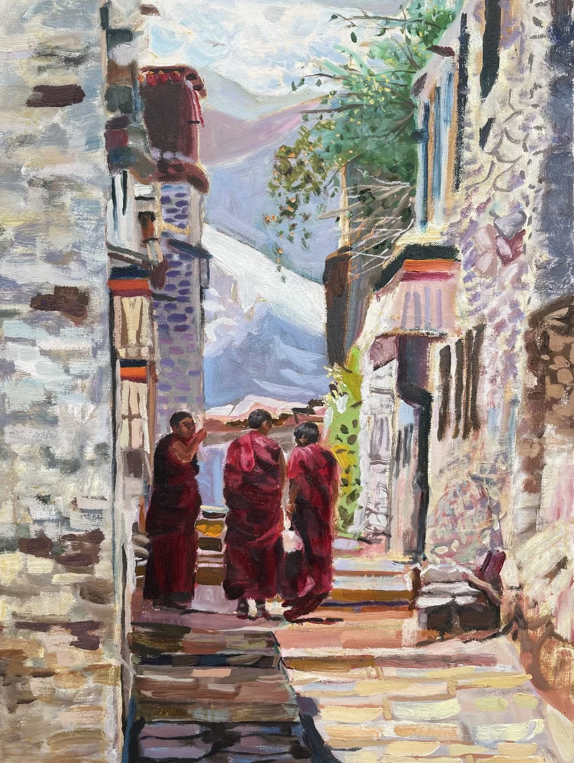 "Afternoon": Sometimes we find peace in the simple things. The three monks in Afternoon are shown strolling through the streets of Tibet, capturing the subtle harmony between the buildings and the mountains and trees, between man and nature - April G