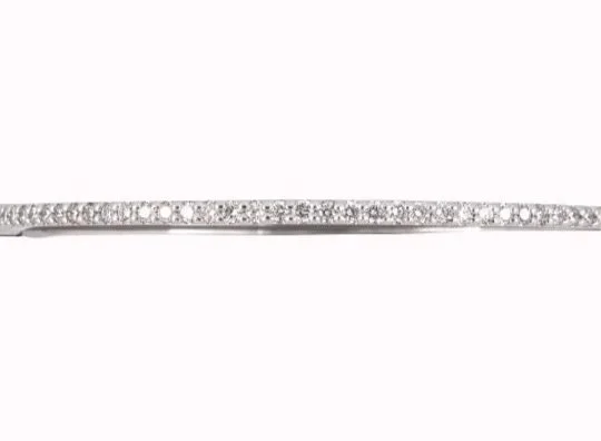 One of two 14-karat white gold hinging bangle bracelets, each set with diamonds weighing about 1.05 carats total. Everyday elegance, whether worn singly or together.