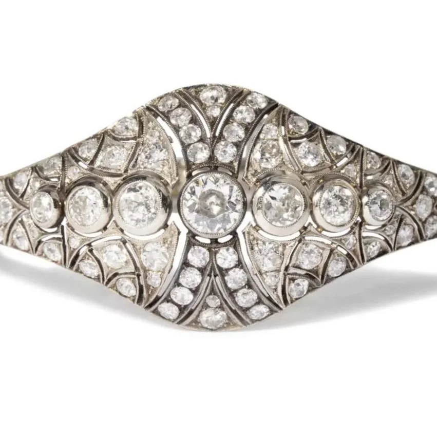 This 14k white gold link bracelet dazzles the eye with more than 10.00 carat in old-cut diamonds.