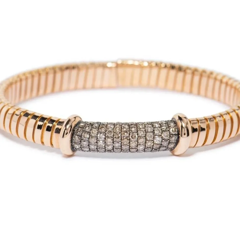 In 18k rose gold, an Italian-made flexible bracelet mounted with 1.58 carats of brown diamonds.