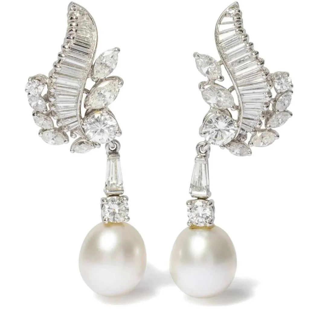 Elegant 14-karat white gold earrings with almost 5.00 carats total diamond weight and detachable pearl drops.