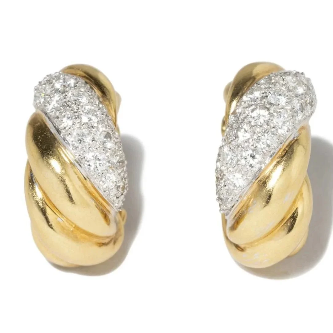Stylish 18k yellow and white gold earrings with diamonds weighing about 2.20 carat total. About 1" top to bottom.