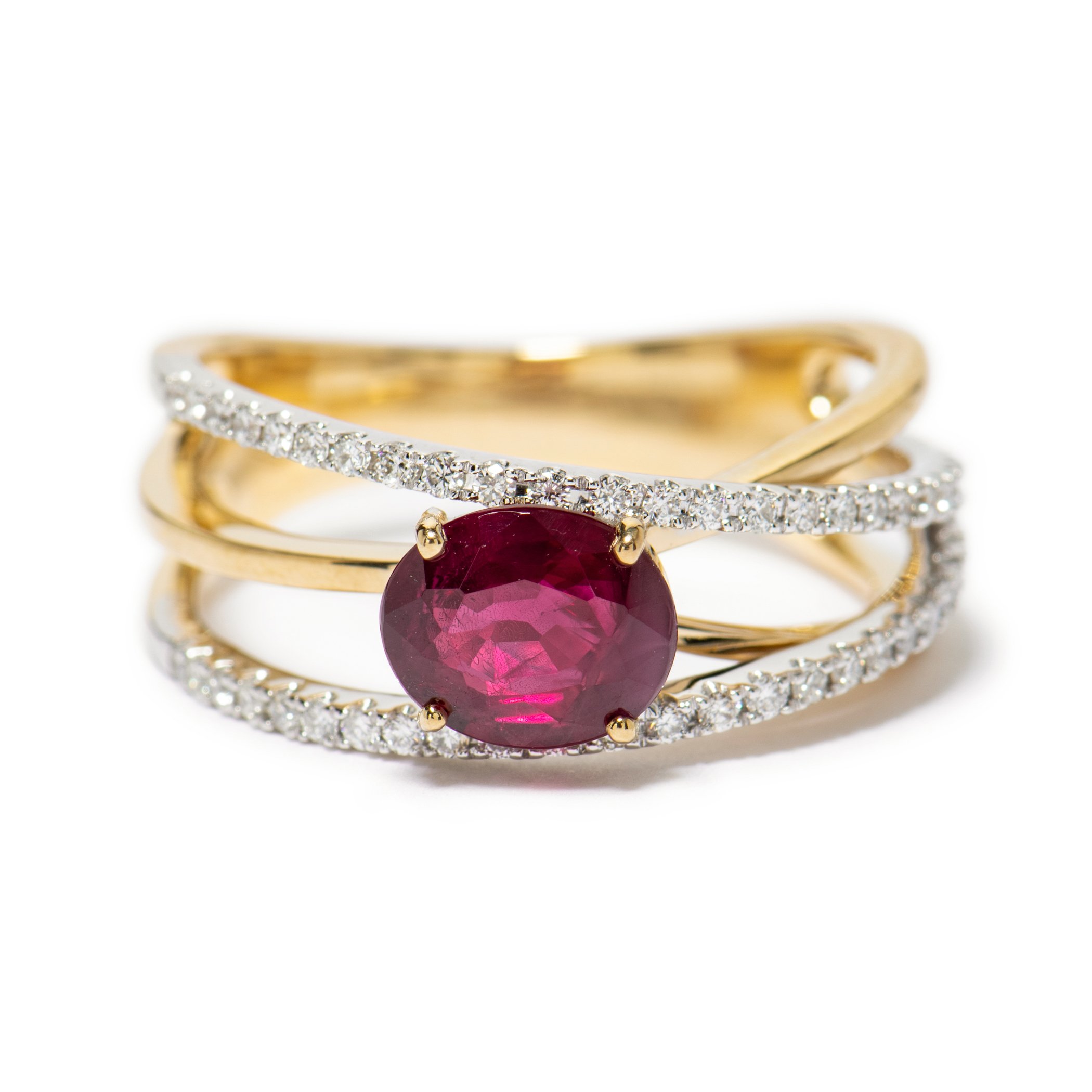 18k yellow and white gold ring with oval Burmese ruby weighing 1.55 carats and round diamonds weighing 0.28 carat total, by Salavetti (vintage)