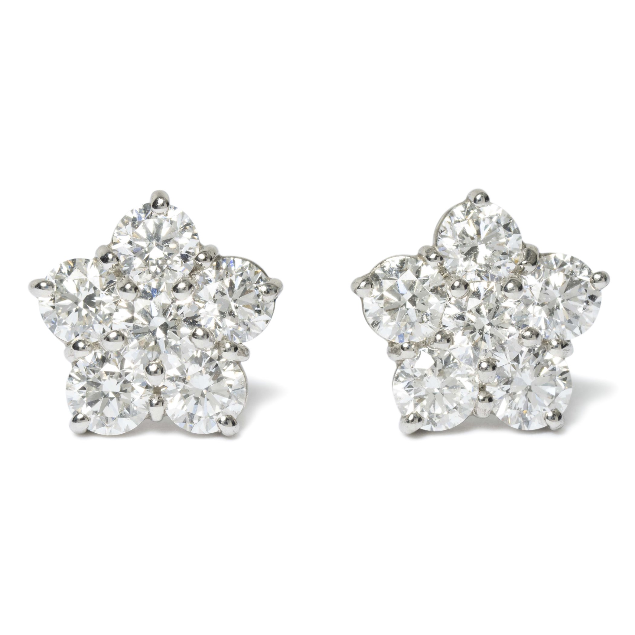 Platinum earrings with round diamonds weighing 2.95 carats total (estate)