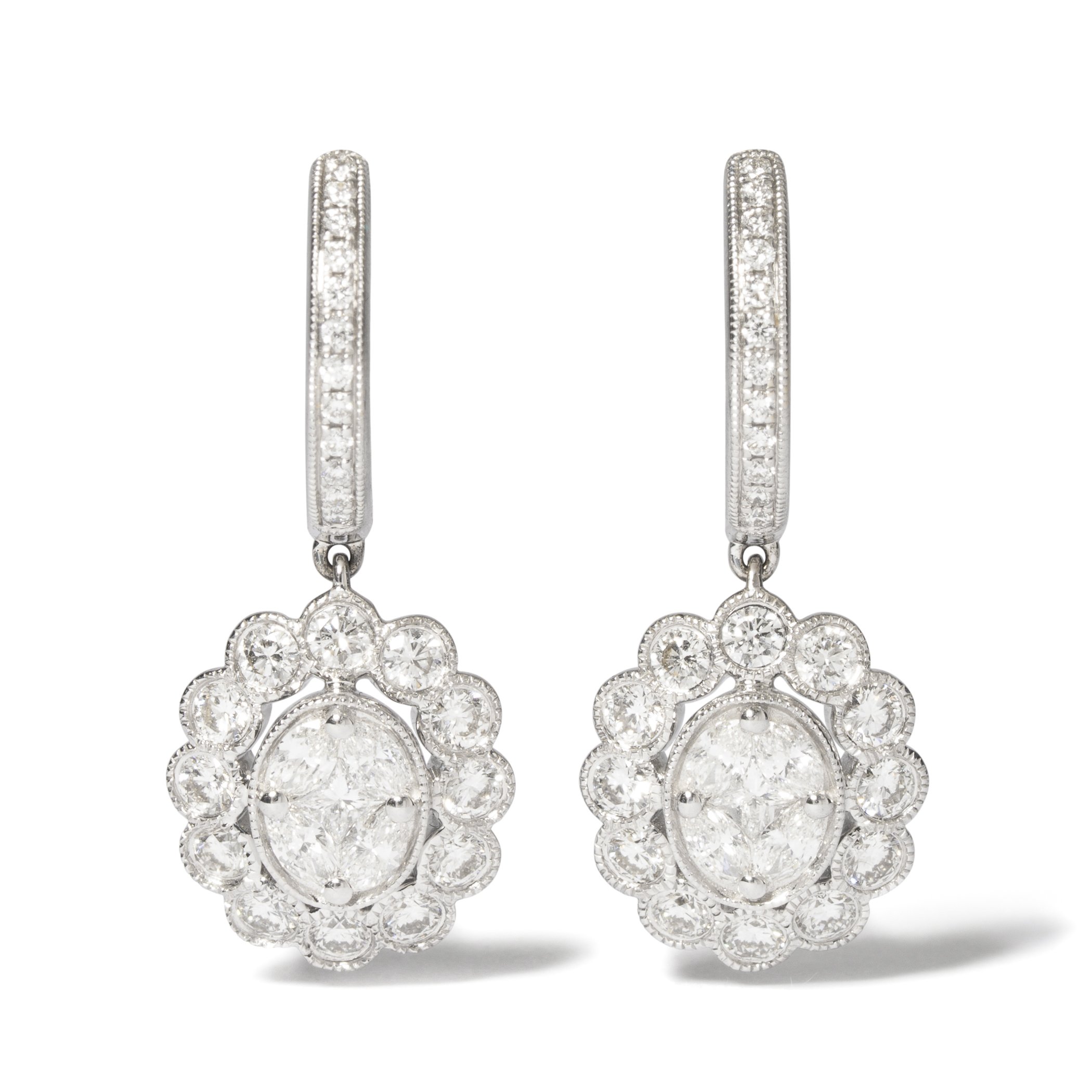 Dazzling 18k white gold hoop and dangle earrings, with round, princess and marquise diamonds weighing 1.95 carats total (contemporary)