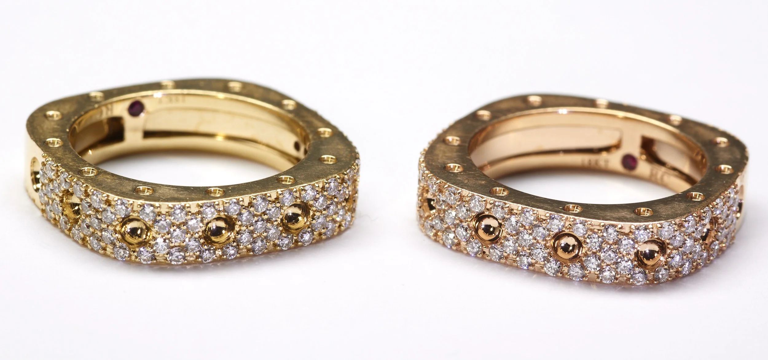 These 18-karat rings from the Poi Moi collection by Roberto Coin have a "soft" square outline. One in green gold and the other in rose gold. Each is mounted with 73 diamonds weighing about 0.75 carat total. Finger size about 7.  Measures 3/8" wide. 