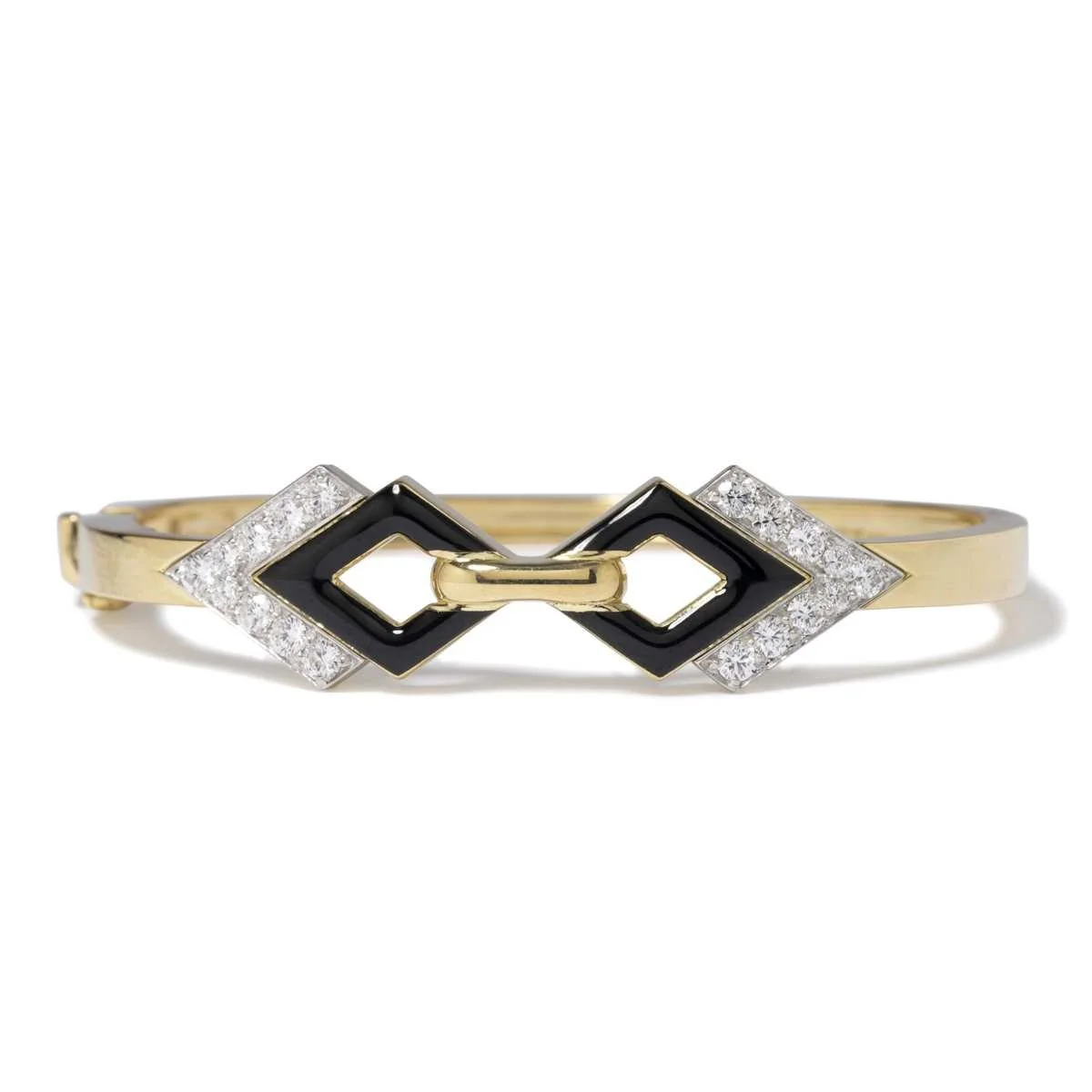 This geometic-designed black enamel and diamond bracelet in platinum and 18k yellow gold is signed by famed American designer David Webb. About 0.98 carat total diamond weight.