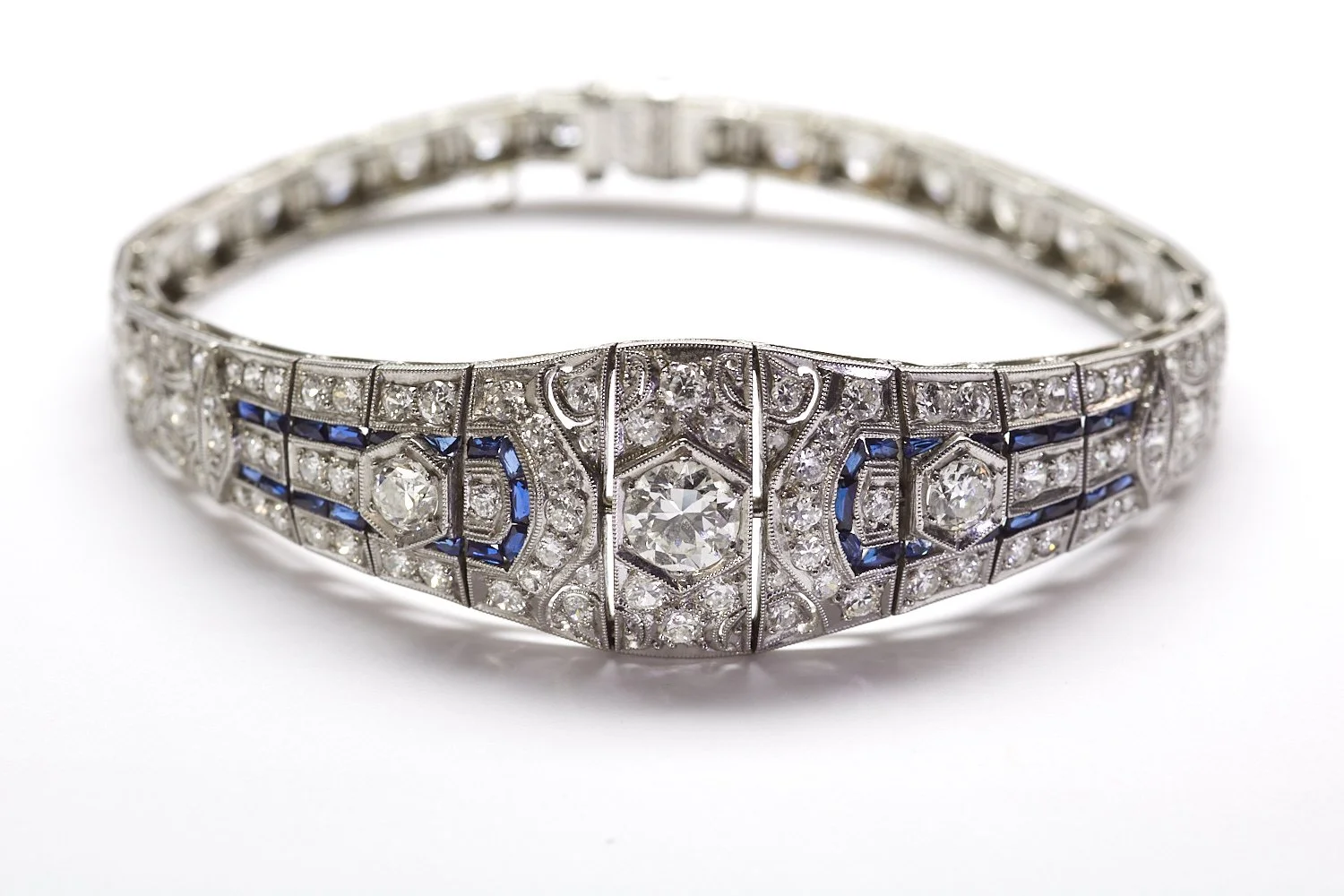 A stunning, 
classic Art Deco diamond bracelet. Total diamond weight is approximately 6.12 carats.