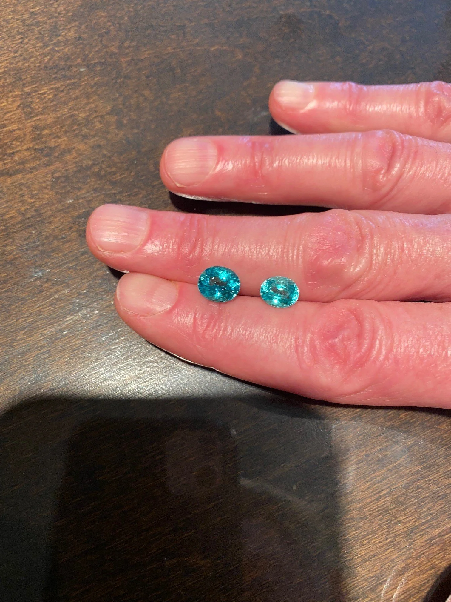 Paraiba tourmaline is the one of the most sought-after gems in the world. Named for the state in Brazil where it was discovered, traces of copper in its makeup give it stunning glowing green-blue to blue-green color.