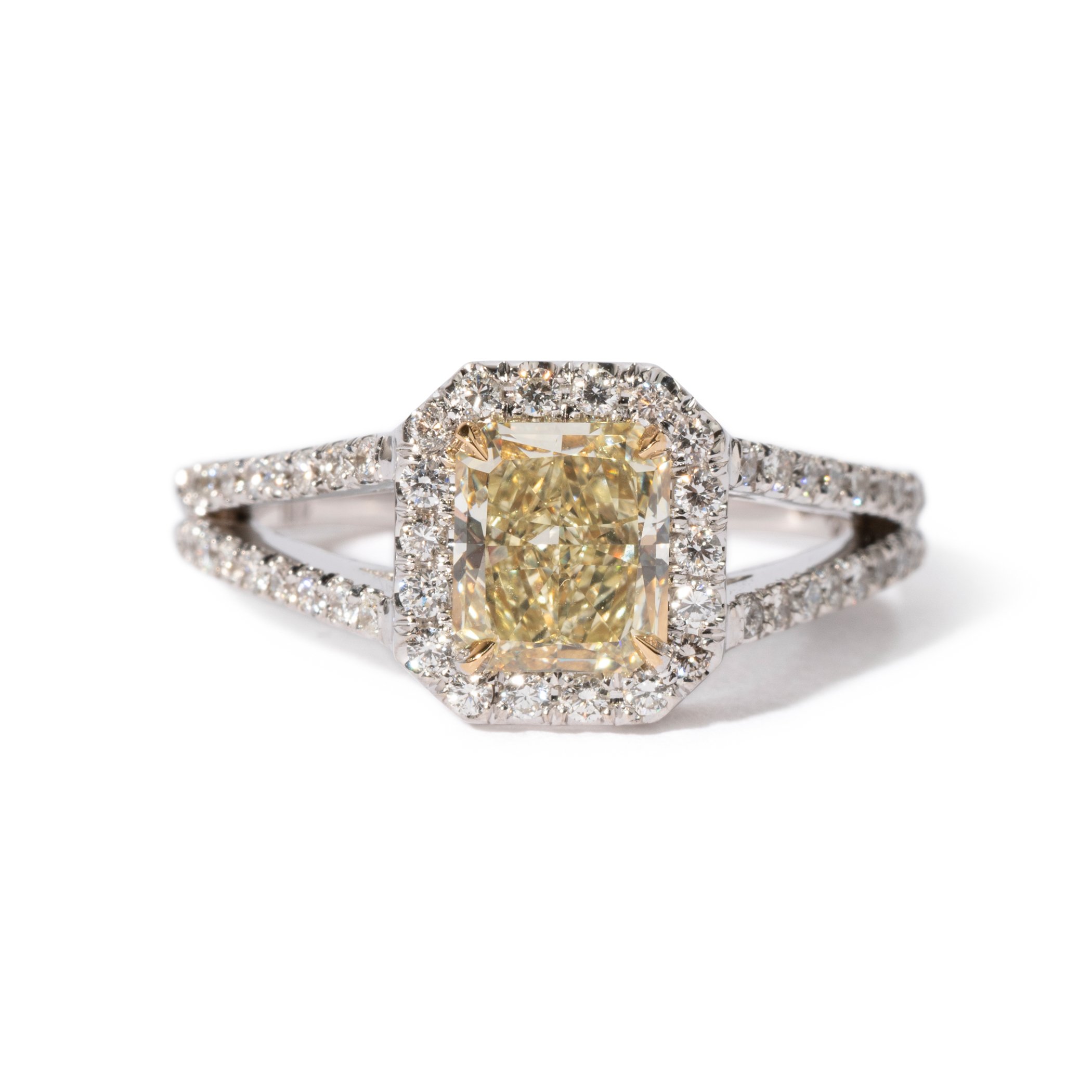 18k yellow and white gold ring with natural yellow radiant-cut diamond weighing 1.29 carats and white diamonds weighing 0.37 carat total, by Salavetti Bionda (contemporary)