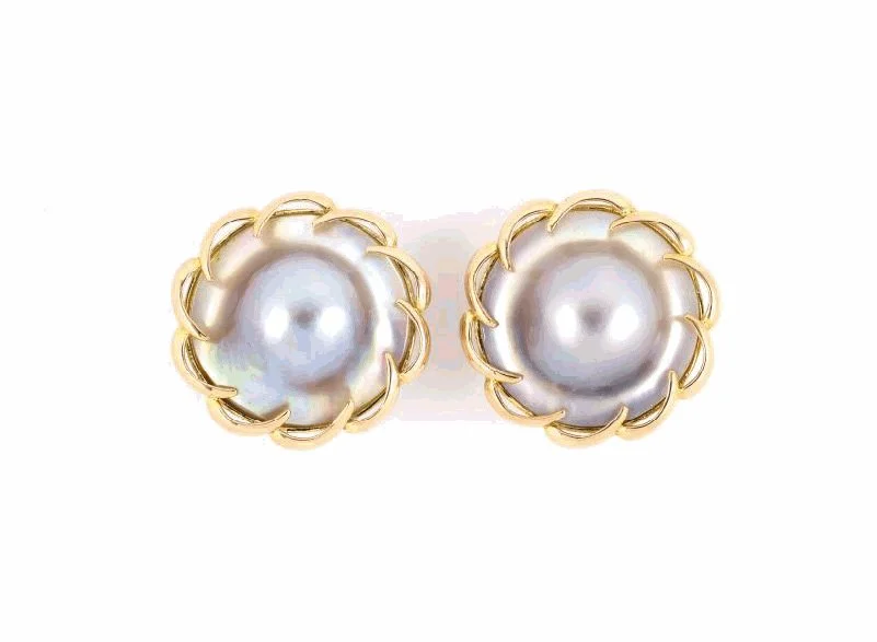 Large 14-karat yellow gold blister pearl earrings with scalloped borders.