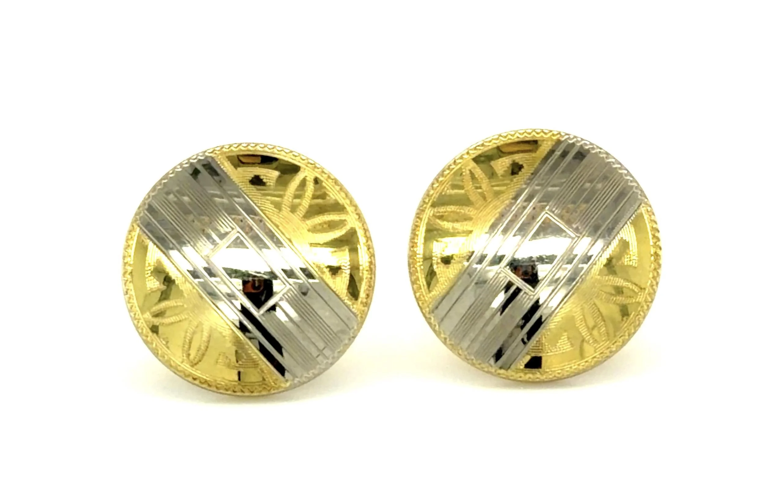 These 10-karat white and yellow gold earrings were converted from cufflinks and are from the Art Deco period. 