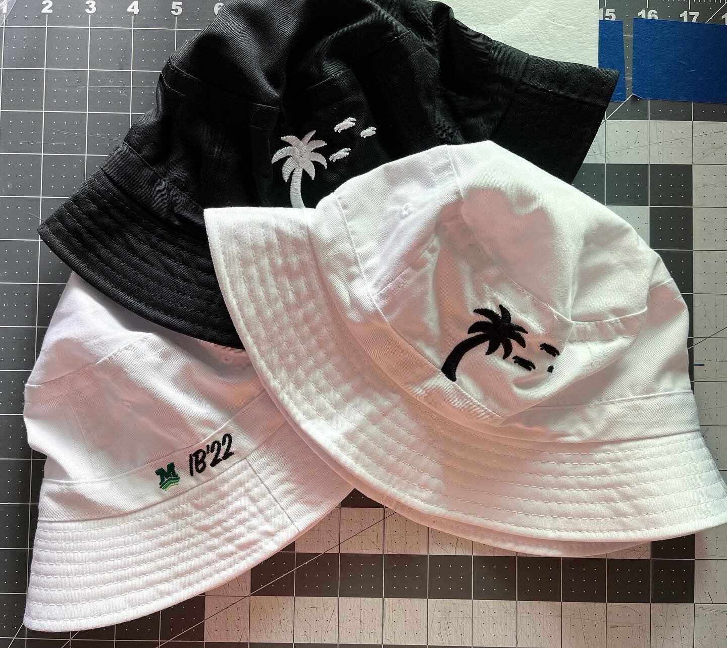 Some MPI co/2022 bucket hats! The final vs the student concept. #embroidery #co2022 #mpi