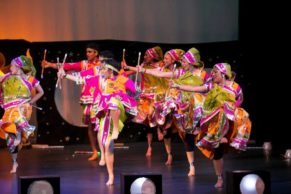  Raas  
A Gujarati folk dance performed with  dandiya , a pair of sticks that are twirled and hit together to make a rhythm. Dancers line up in pairs and switch partners after each pattern of beats.