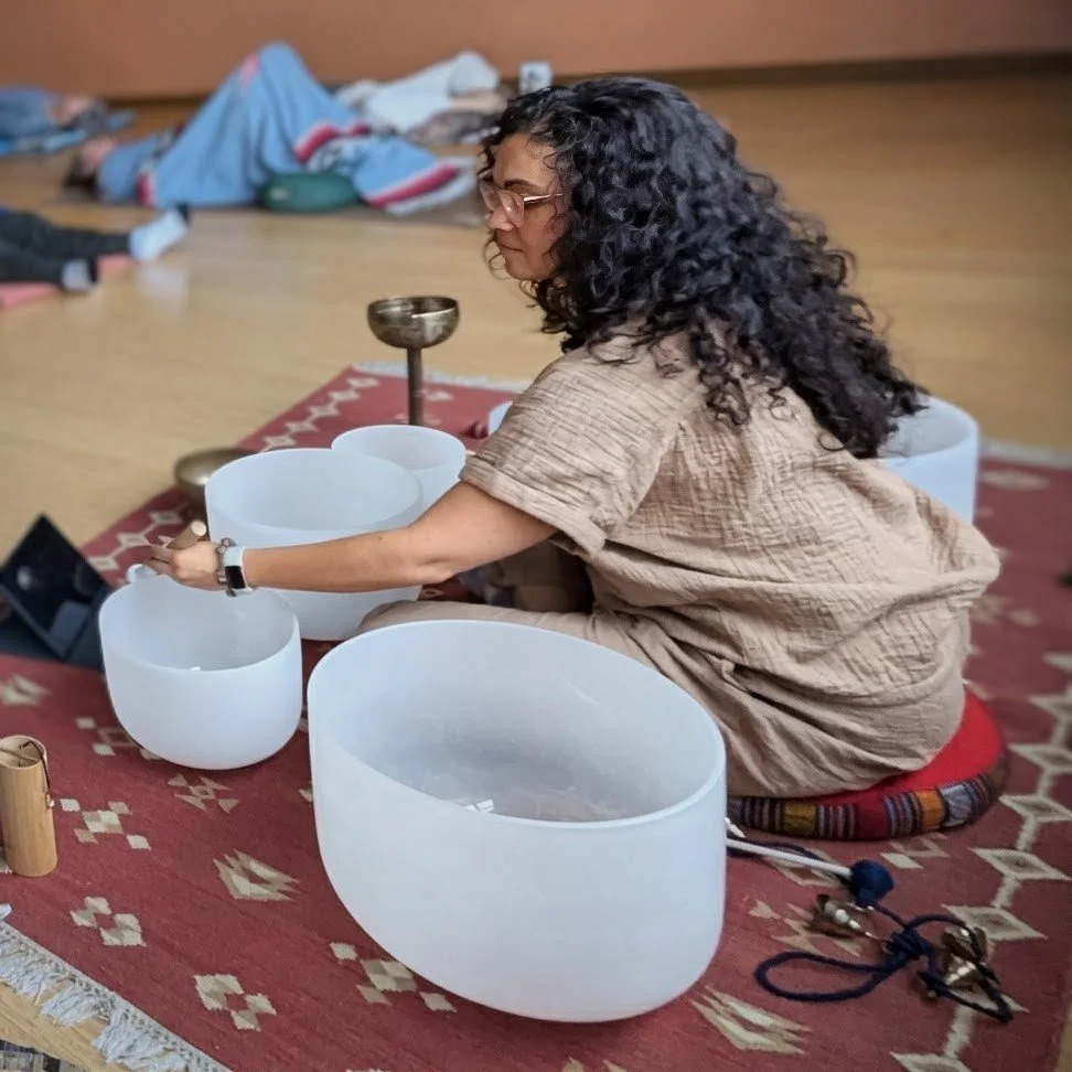 A group sound healing with a gong, sound bowl and sound healer.