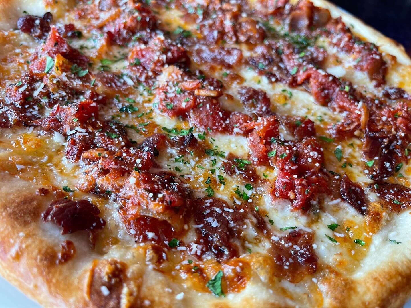 Wanna try something new?

Amatriciana Pizza:
An upside style pizza with provolone and mozzarella cheese, topped with Amatriciana sauce (guanciale, onions, garlic, capers, pepper flakes and tomatoes), crispy pork jowl, pecorino and parsley. 
.
#tasteb