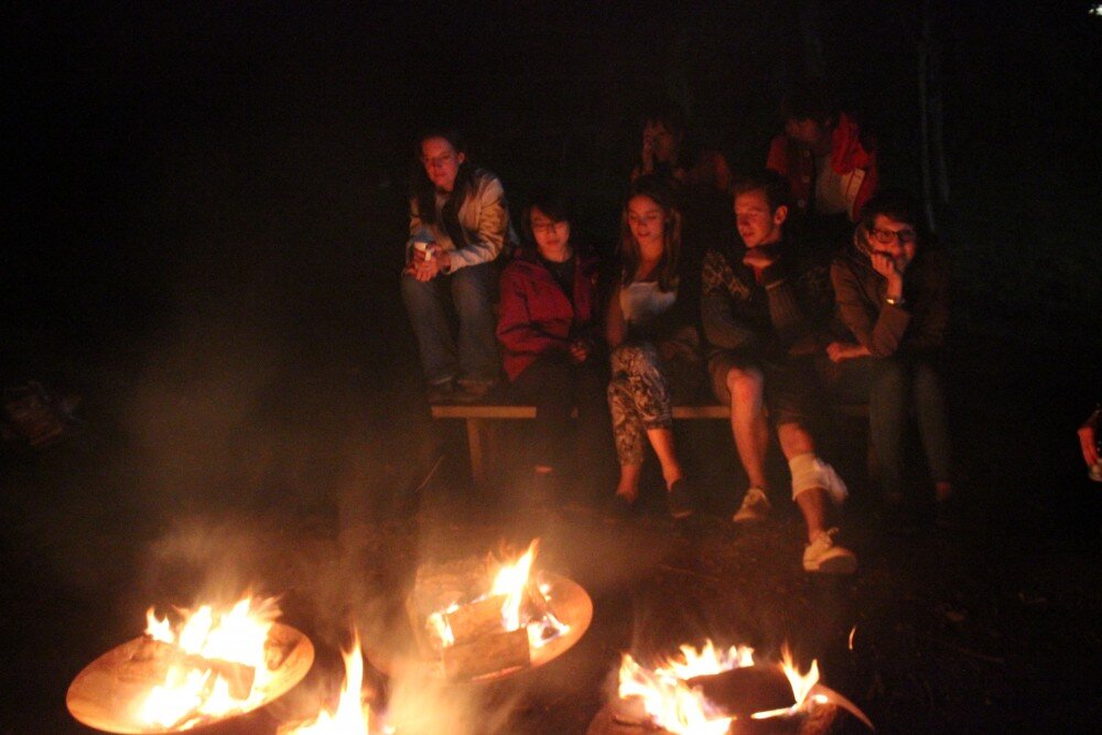 Sitting round a fire
