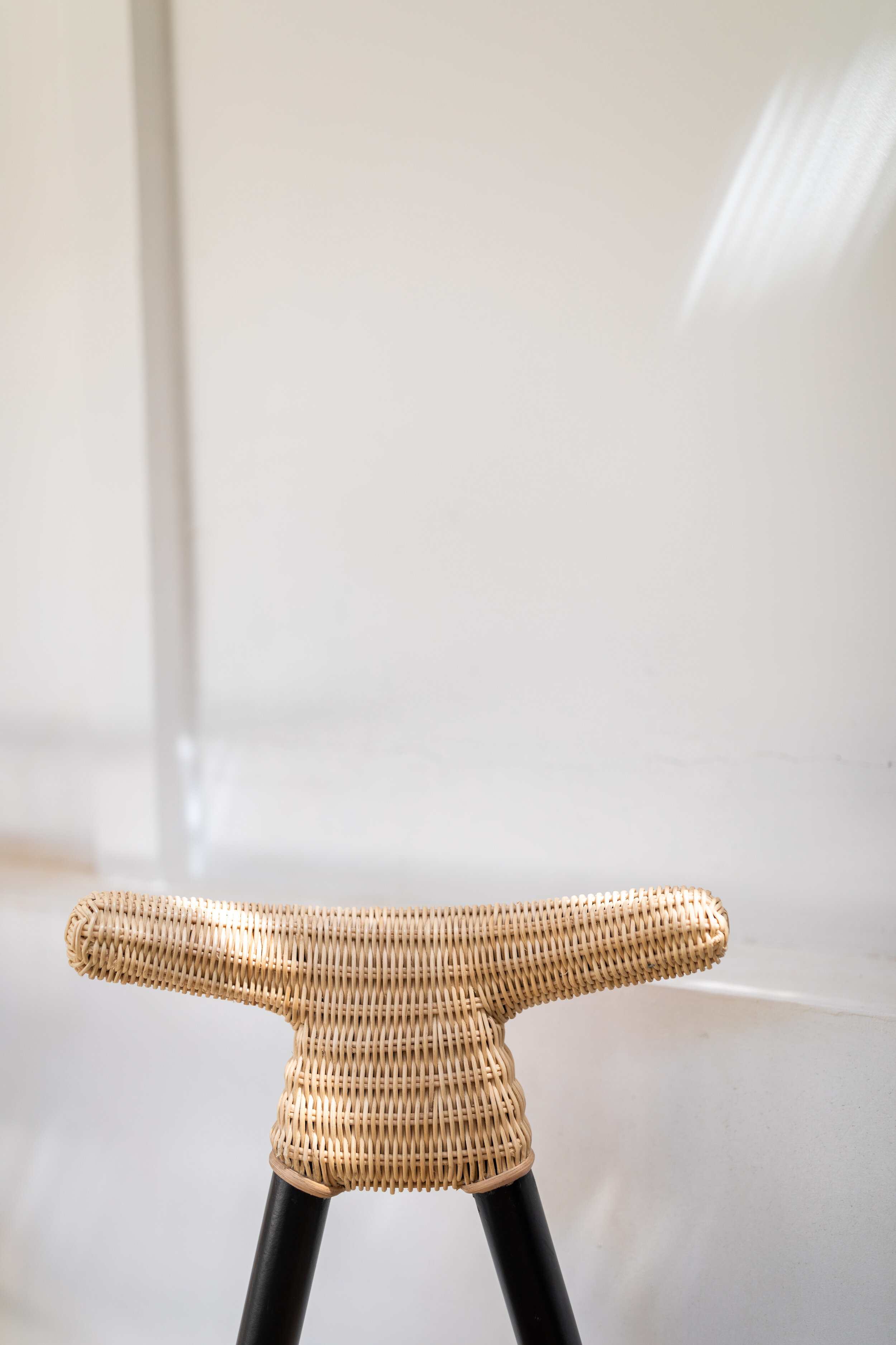 DESIGNER RATTAN / BLACK WOOD LEGS 