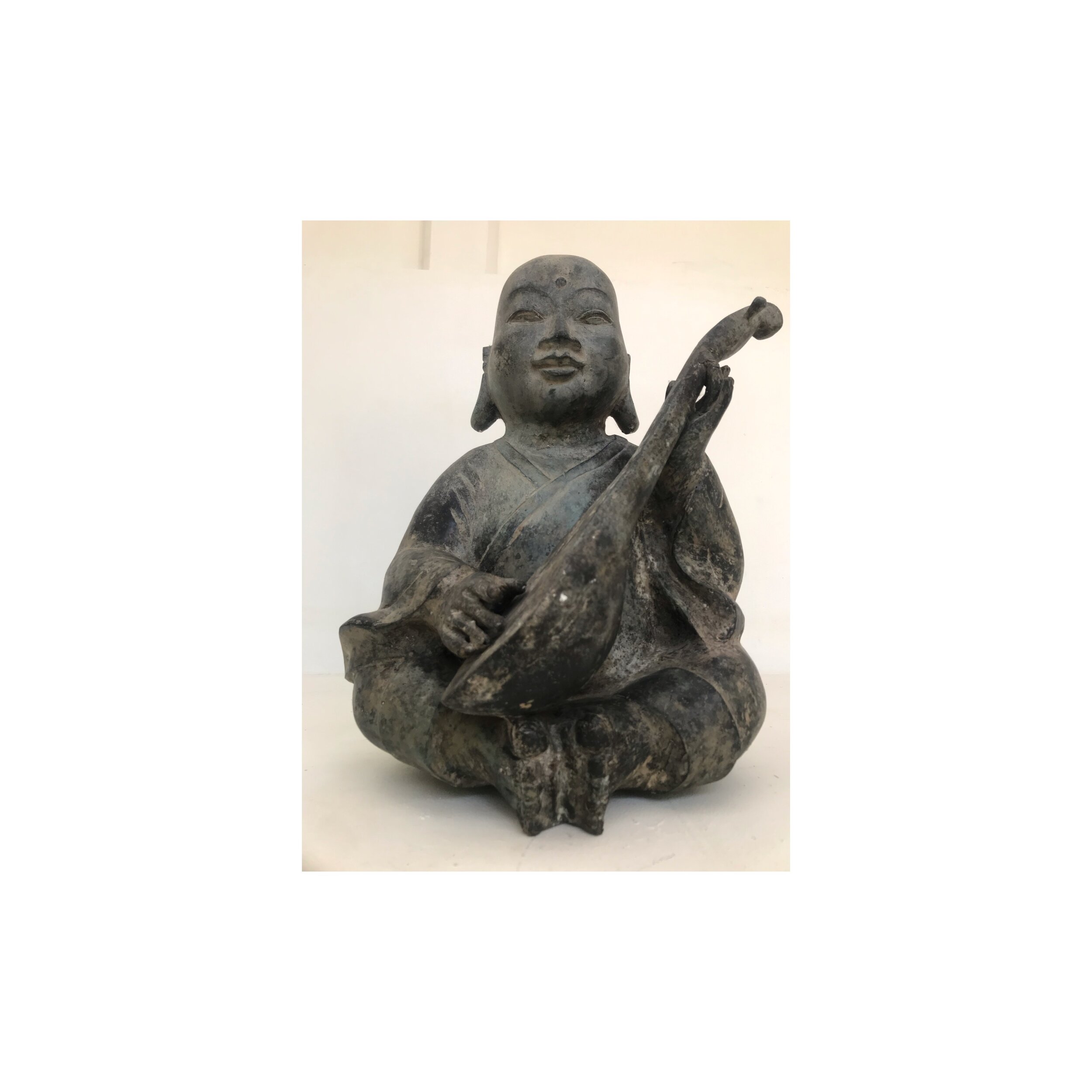 SITTING BUDHA WITH GUITAR 