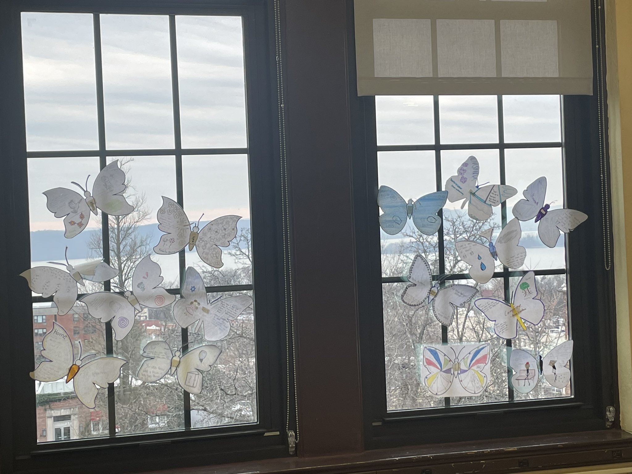 Butterflies represent resilience and hope. Students created butterflies based on artwork and poems from children in the Holocaust before reading "Night".